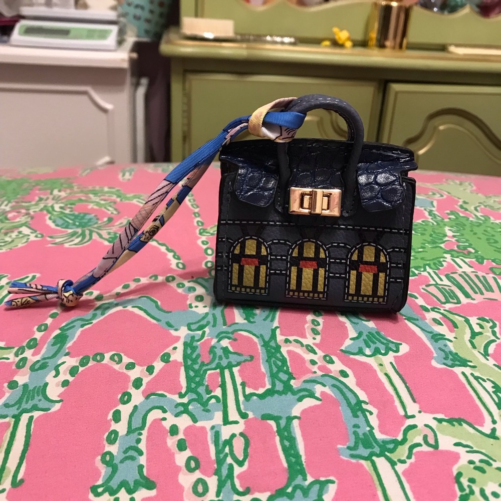 Navy Blue AirPod case that looks like a mini birken